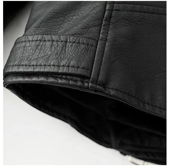 Trendy slim-fit jacket Slim-fit Motorcycle Jacket All close-up of black imitation leather sleeve detail.